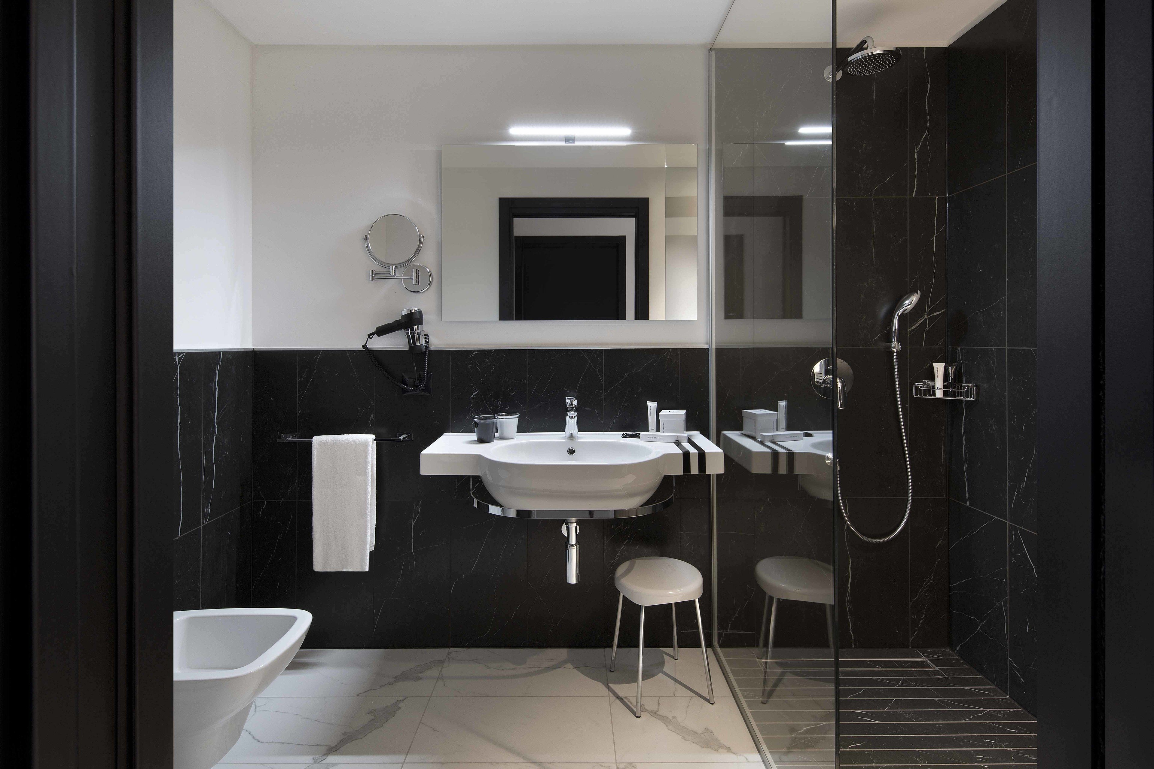 shower, free toiletries, hair dryer, slippers