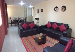 Apartment, 3 Bedrooms (B4) | Living room | Flat-screen TV - Apart Hotel Incamin (Arequipa)