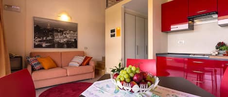 Duplex | Área de estar | TV de tela plana