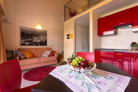 Duplex | Living area | Flat-screen TV