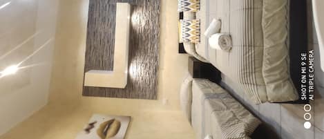 Individually decorated, individually furnished, desk, rollaway beds