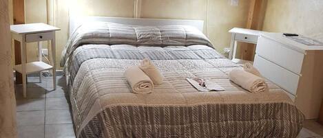 Individually decorated, individually furnished, desk, rollaway beds