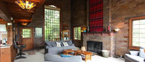 Cabin, 4 Bedrooms, Balcony, River View | Living area | Flat-screen TV, fireplace