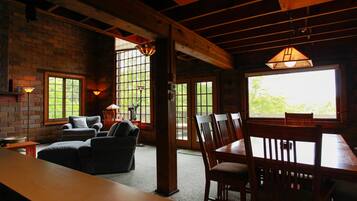 Cabin, 4 Bedrooms, Balcony, River View | Living area | Flat-screen TV, fireplace