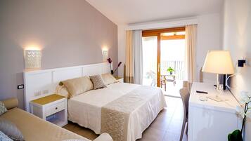 Quarto quádruplo família | 1 quarto, cofres nos quartos, Wi-Fi de cortesia, roupa de cama