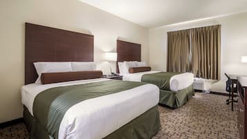 Premium bedding, down comforters, pillowtop beds, in-room safe