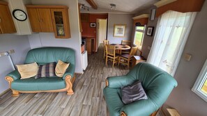 Comfort Mobile Home, 2 Bedrooms, Hill View, Mountainside | Living room | Flat-screen TV - Hawthorn Cottages B&B (Oban)