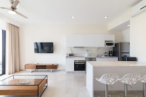 Apartment, 2 Bedrooms | Private kitchen | Fridge, microwave, coffee/tea maker, cookware/dishes/utensils