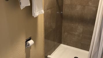 Habitación individual Deluxe, 1 cama King size | Regadera en el baño