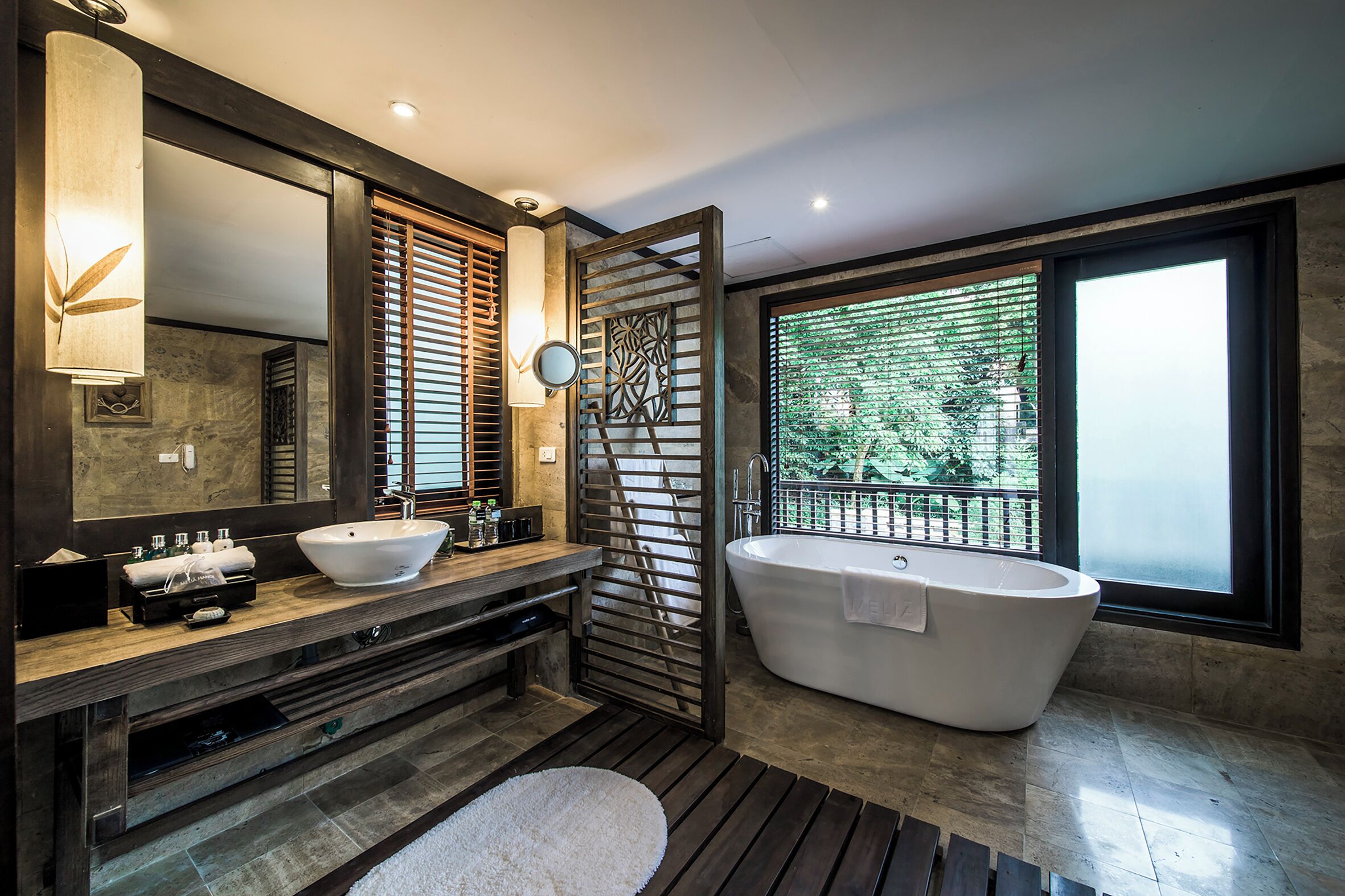 family master suite | bathroom | rainfall showerhead, eco-friendly toiletries, hair dryer, bathrobes