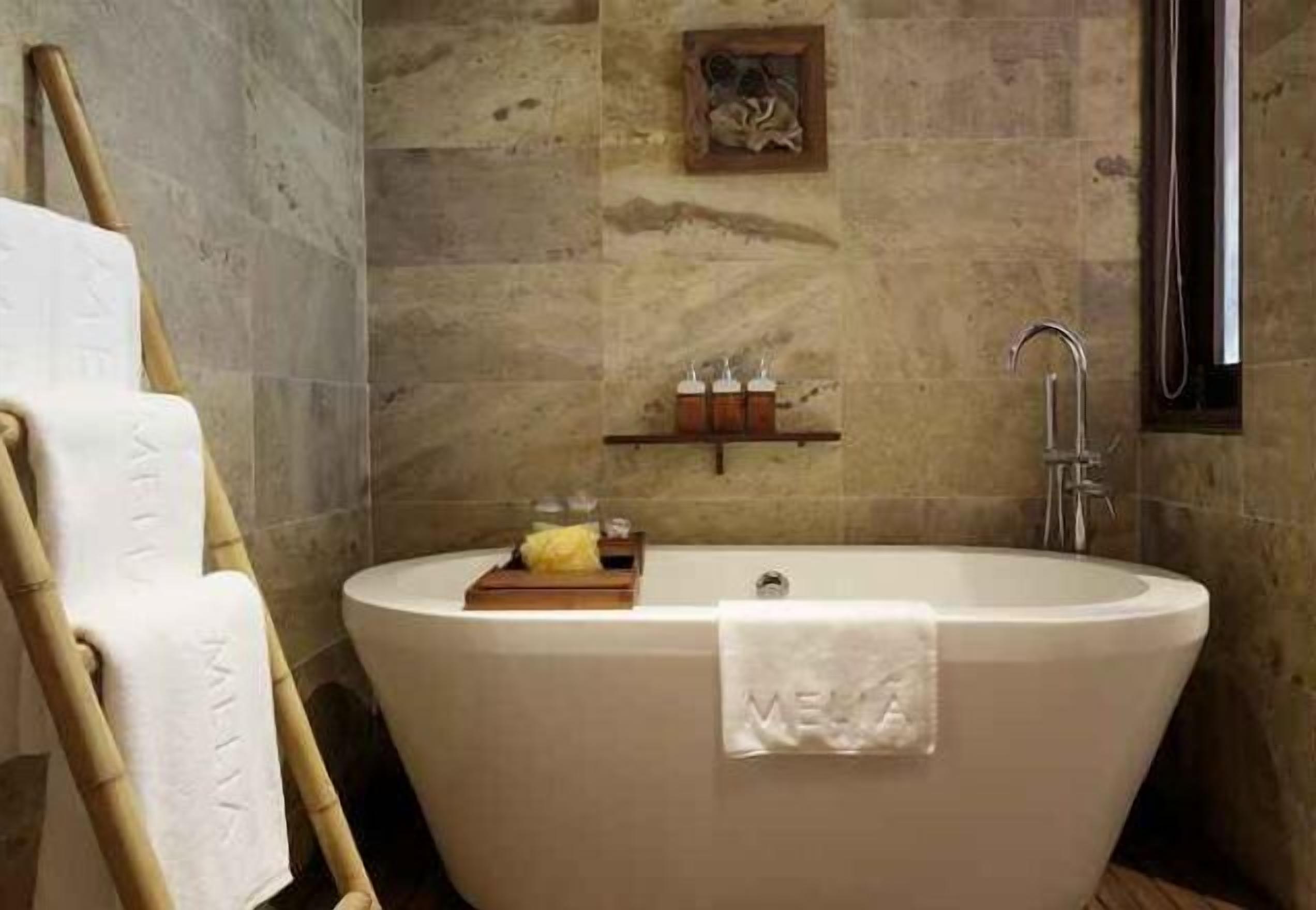 Bathroom | Rainfall showerhead, eco-friendly toiletries, hair dryer, bathrobes