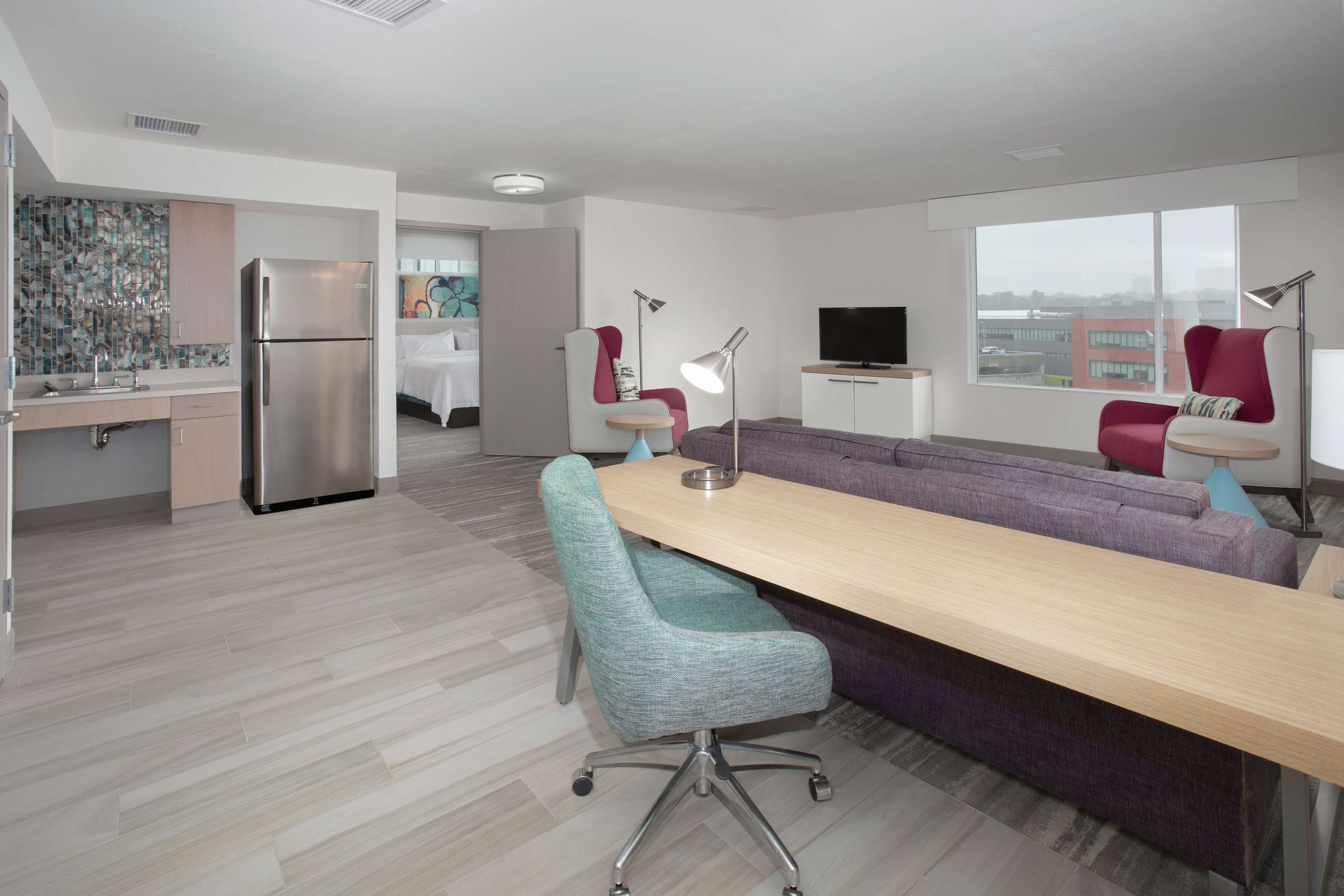 premium bedding, down duvets, tempur-pedic beds, in-room safe