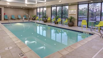 Indoor pool, open 8:00 AM to 10:00 PM, pool loungers