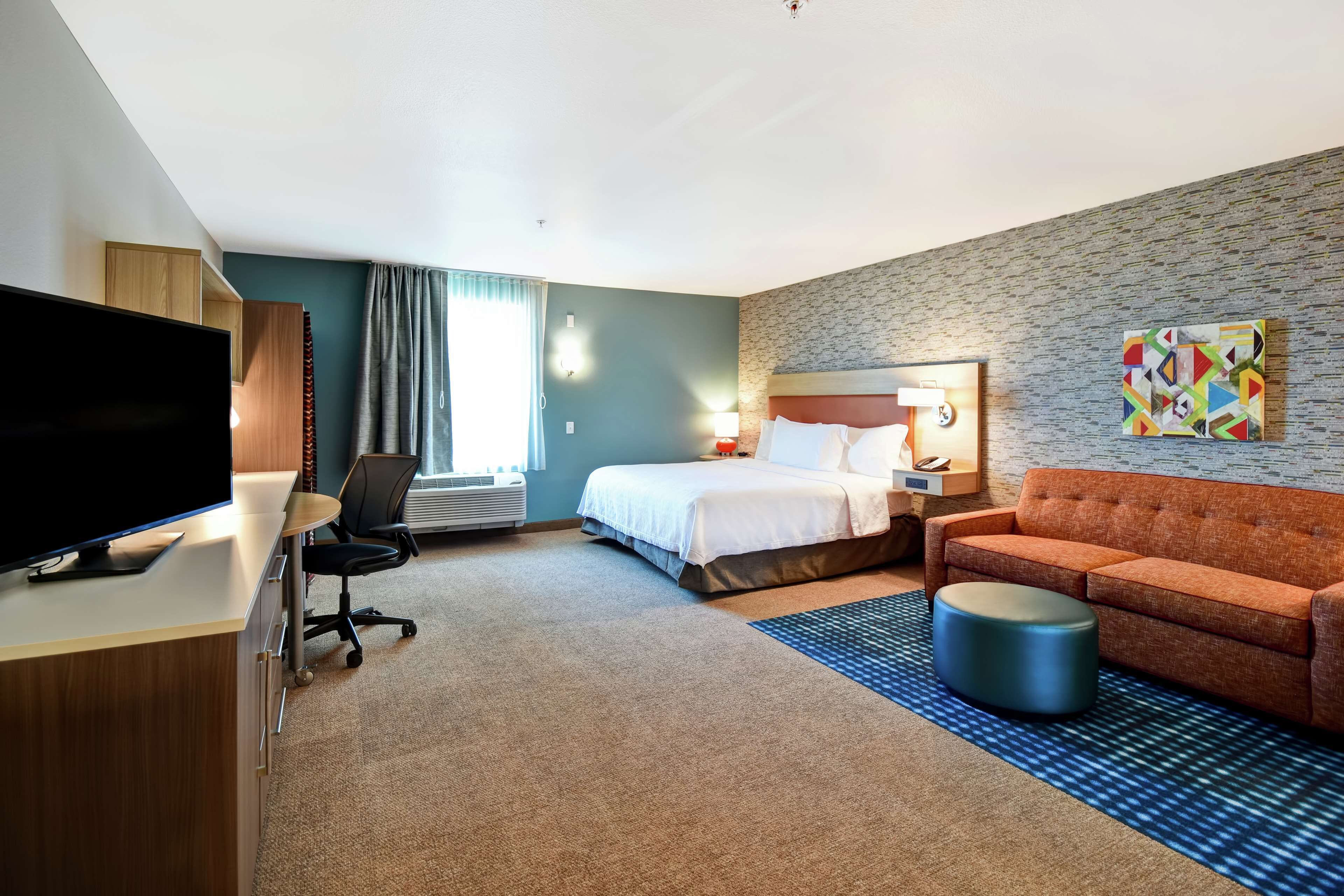 desk, blackout curtains, iron/ironing board, free cots/infant beds