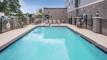 Outdoor pool, open 10:00 AM to 9:00 PM, pool umbrellas, pool loungers