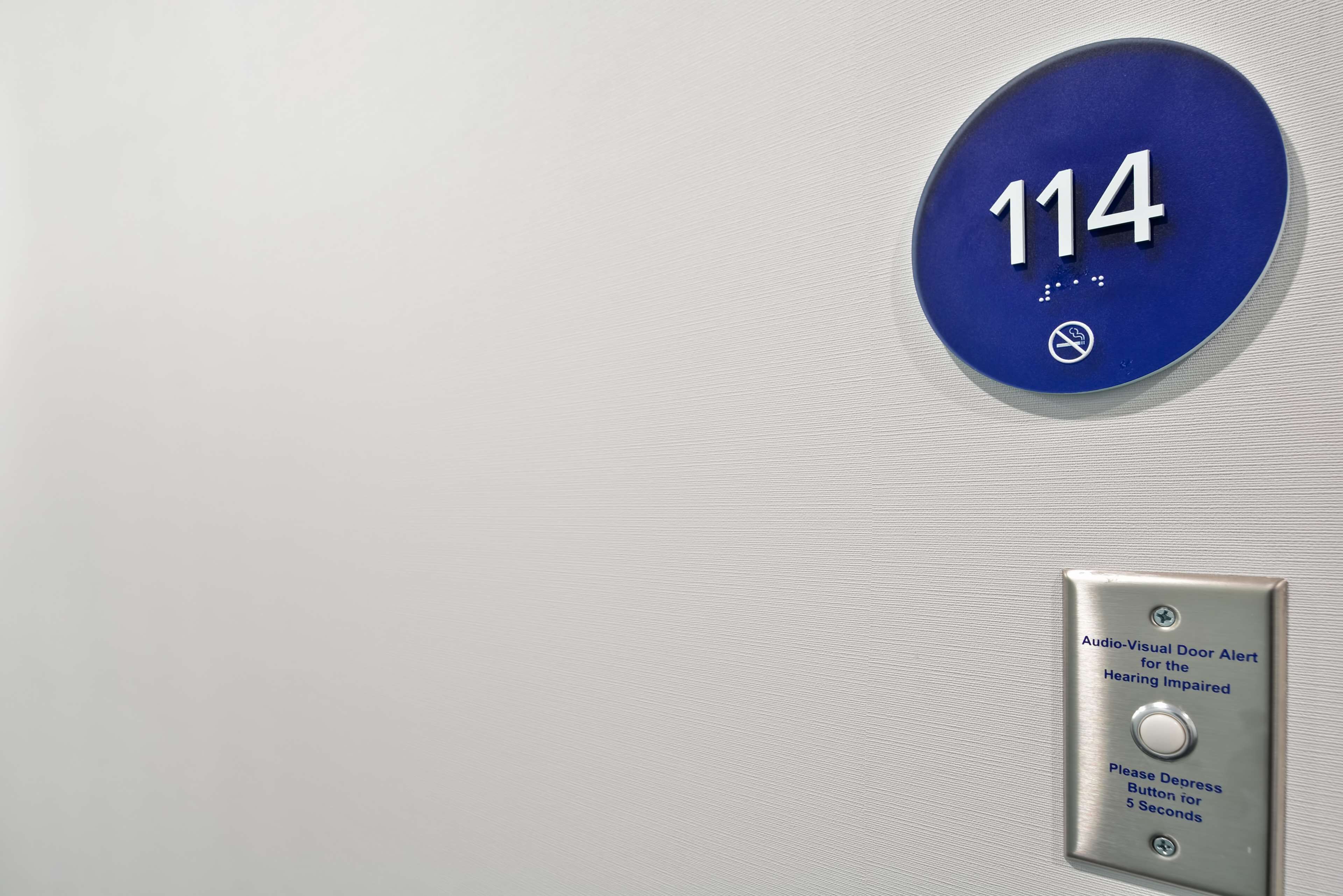 premium bedding, laptop workspace, blackout curtains, iron/ironing board