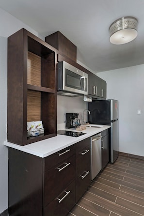 Studio, 2 Queen Beds | Private kitchen | Full-sized fridge, microwave, stovetop, dishwasher