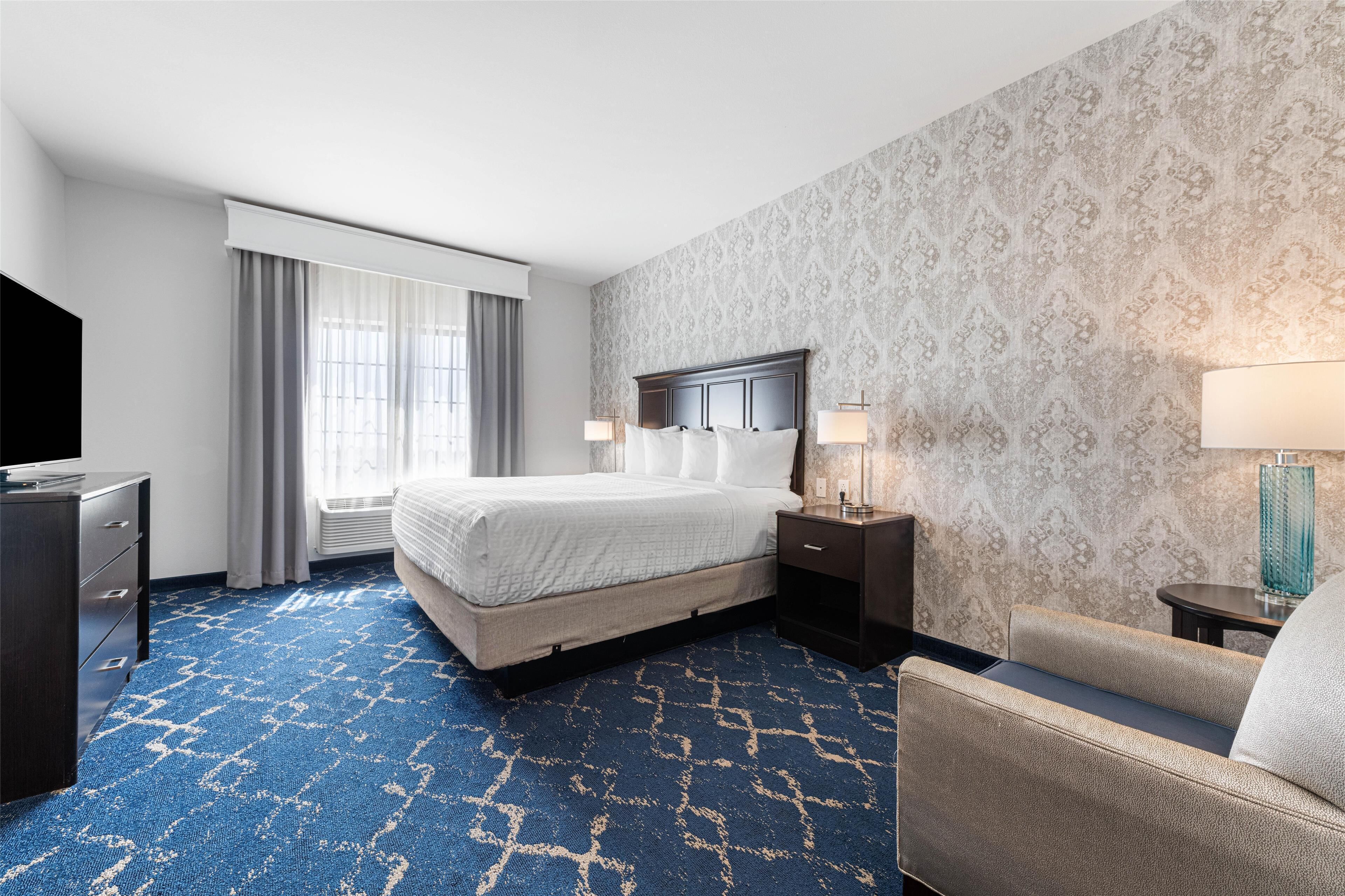 pillow-top beds, desk, blackout curtains, soundproofing