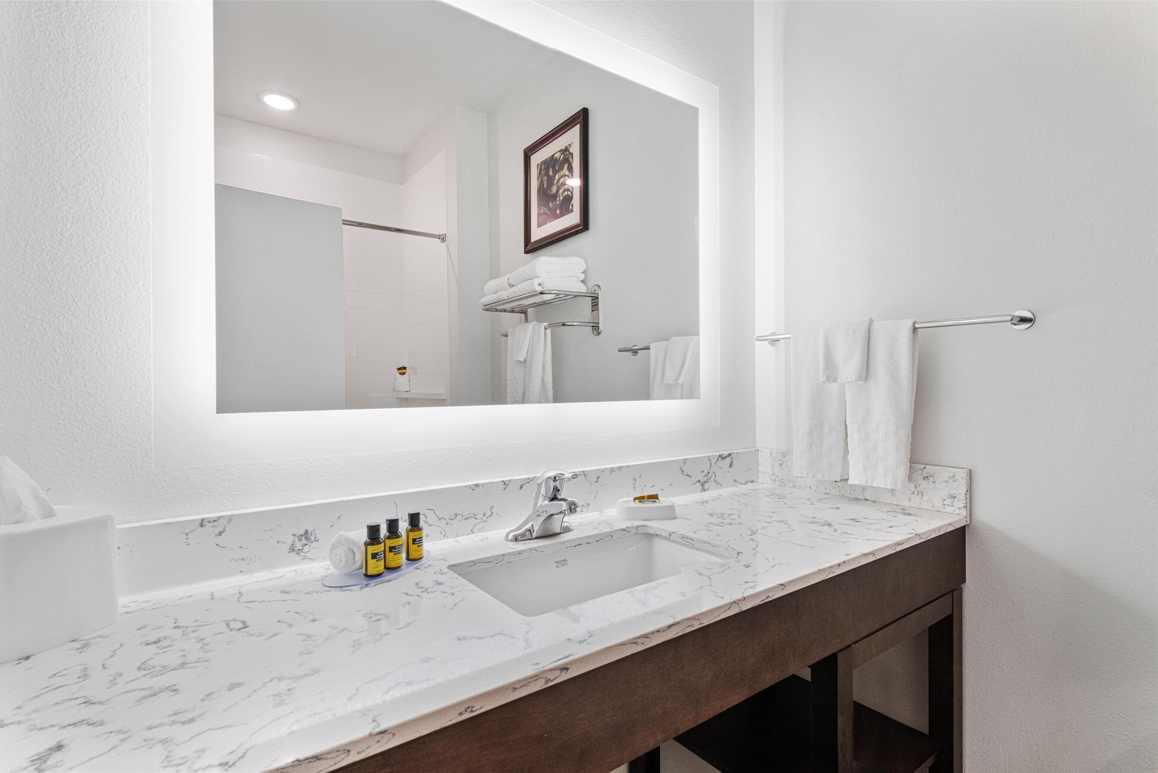 suite, 2 queen beds, non smoking, refrigerator & microwave | bathroom | rainfall showerhead, free toiletries, hair dryer, towels