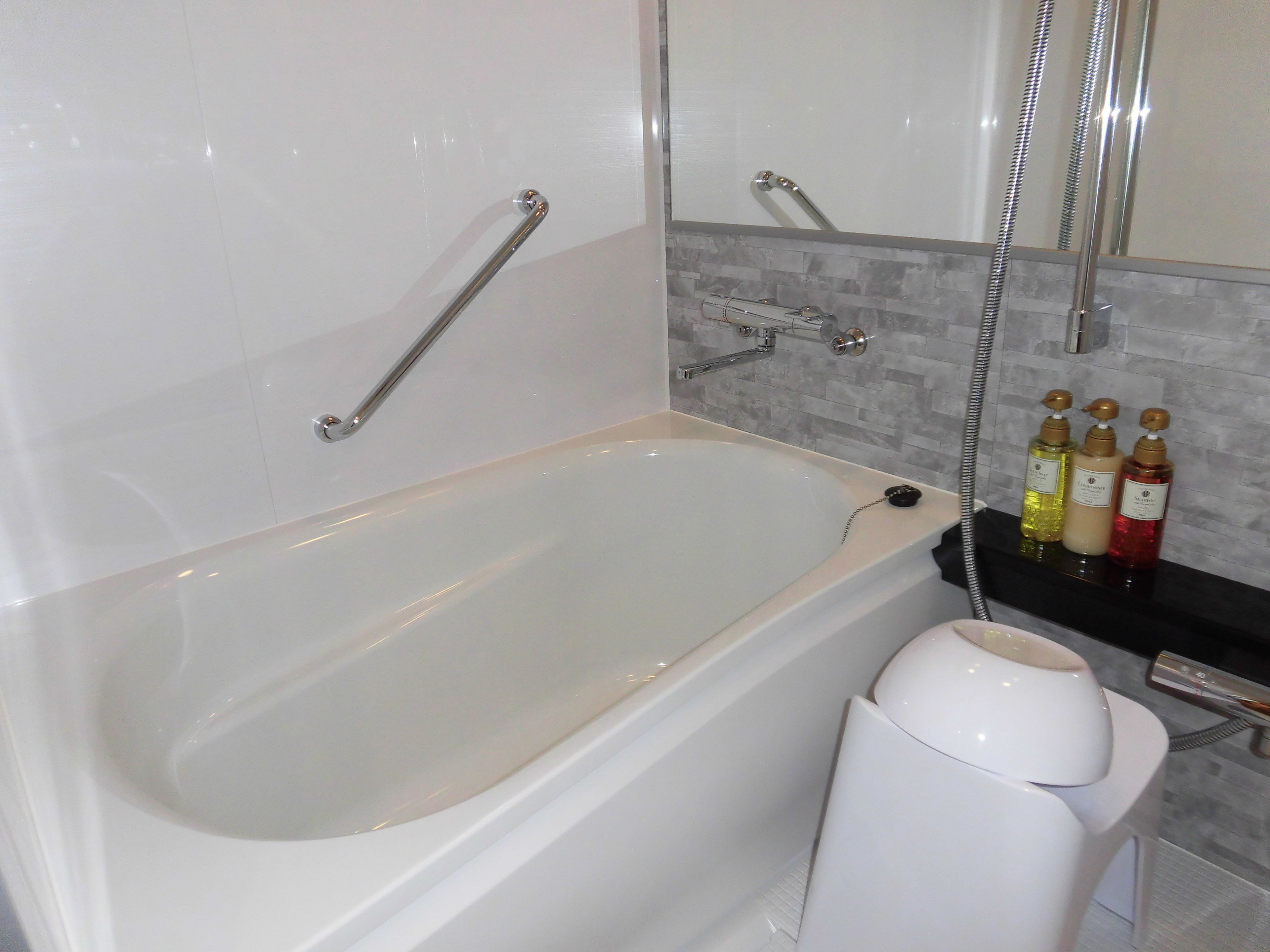 eco-friendly toiletries, hair dryer, slippers, bidet