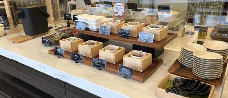 A display of various food items and utensils in a store.
