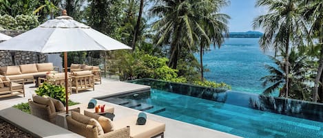 Outdoor pool, pool umbrellas, sun loungers