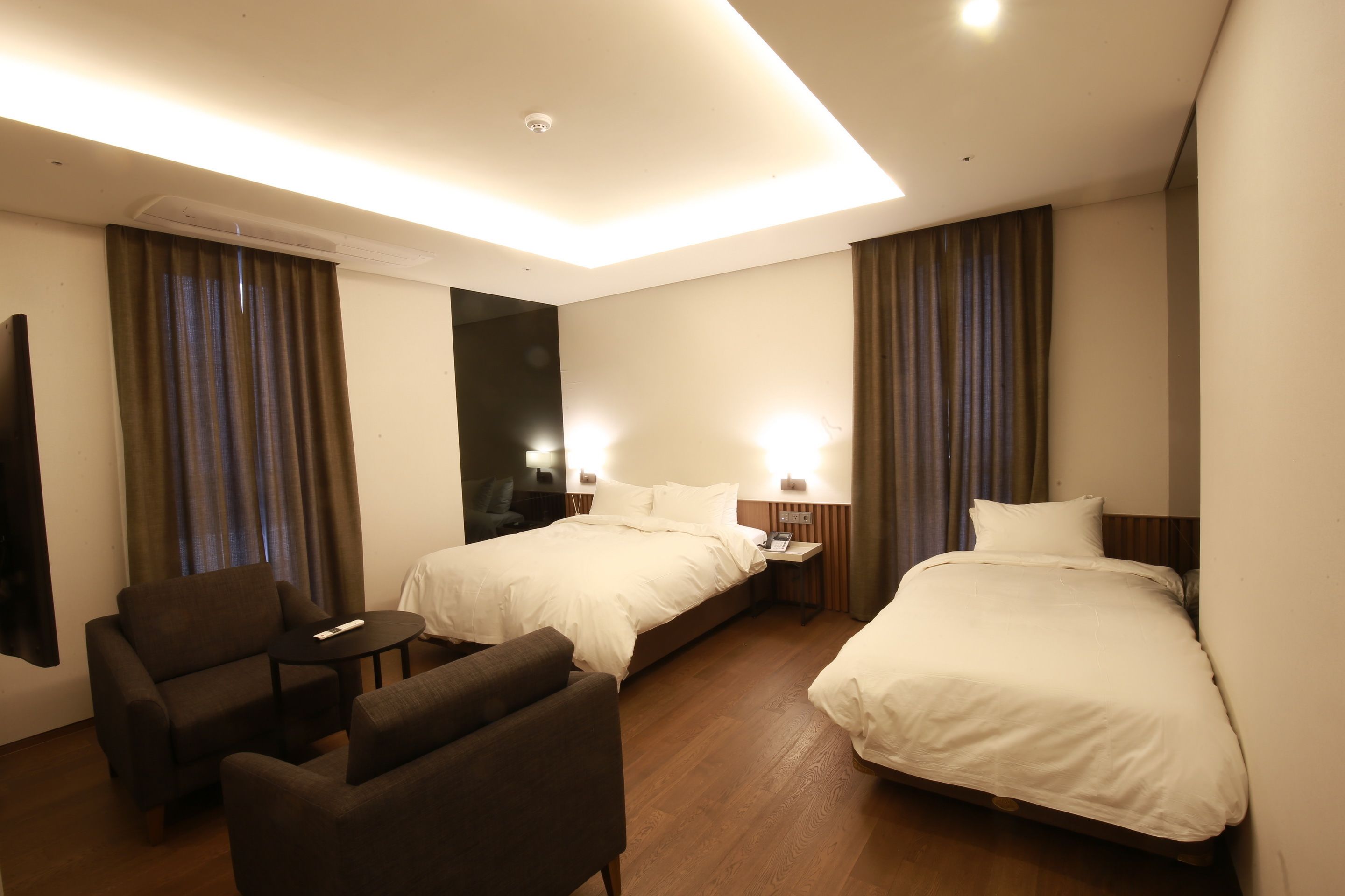 deluxe family room | premium bedding, in-room safe, soundproofing, iron/ironing board