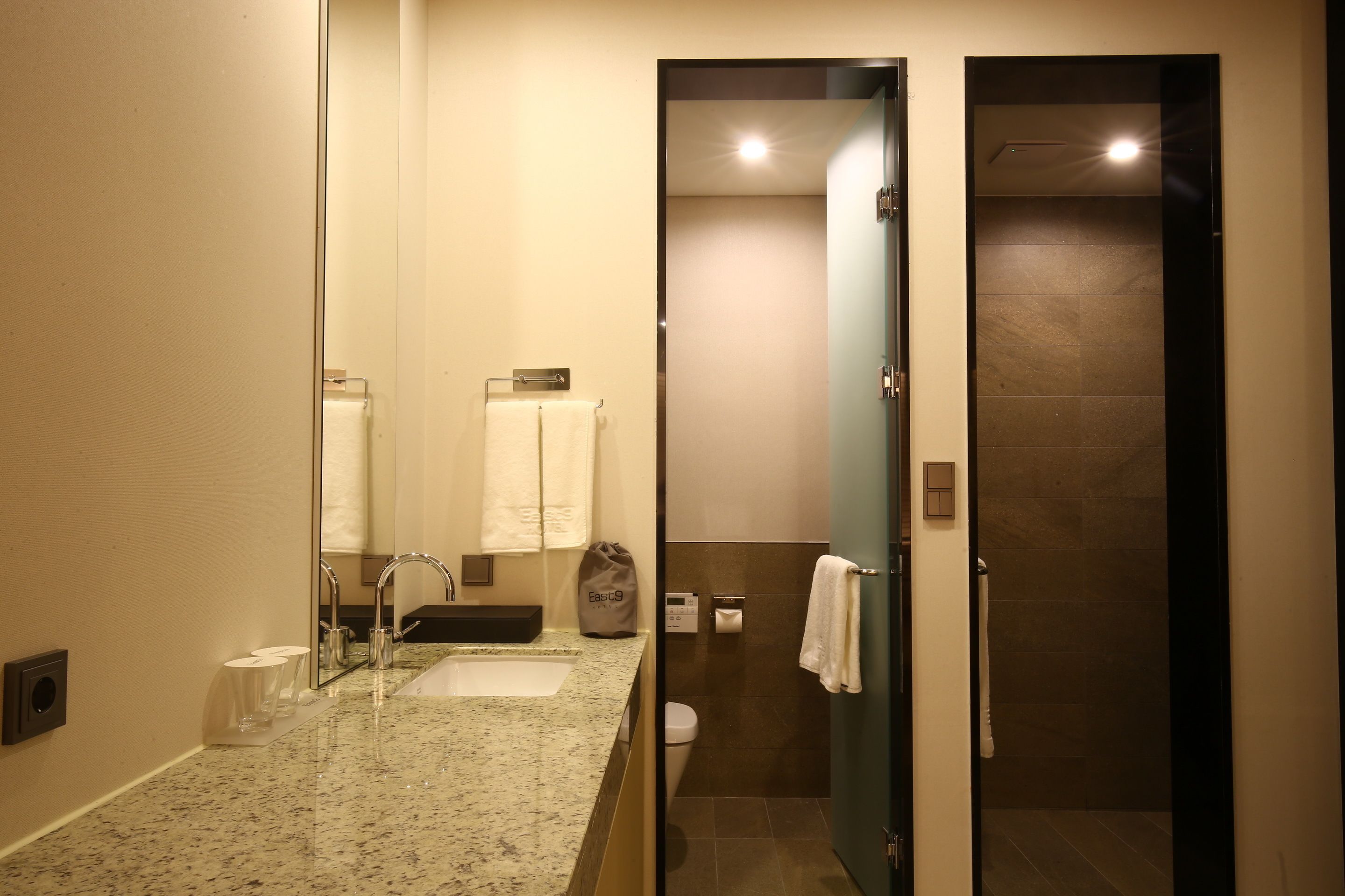 hair dryer, bathrobes, slippers, bidet