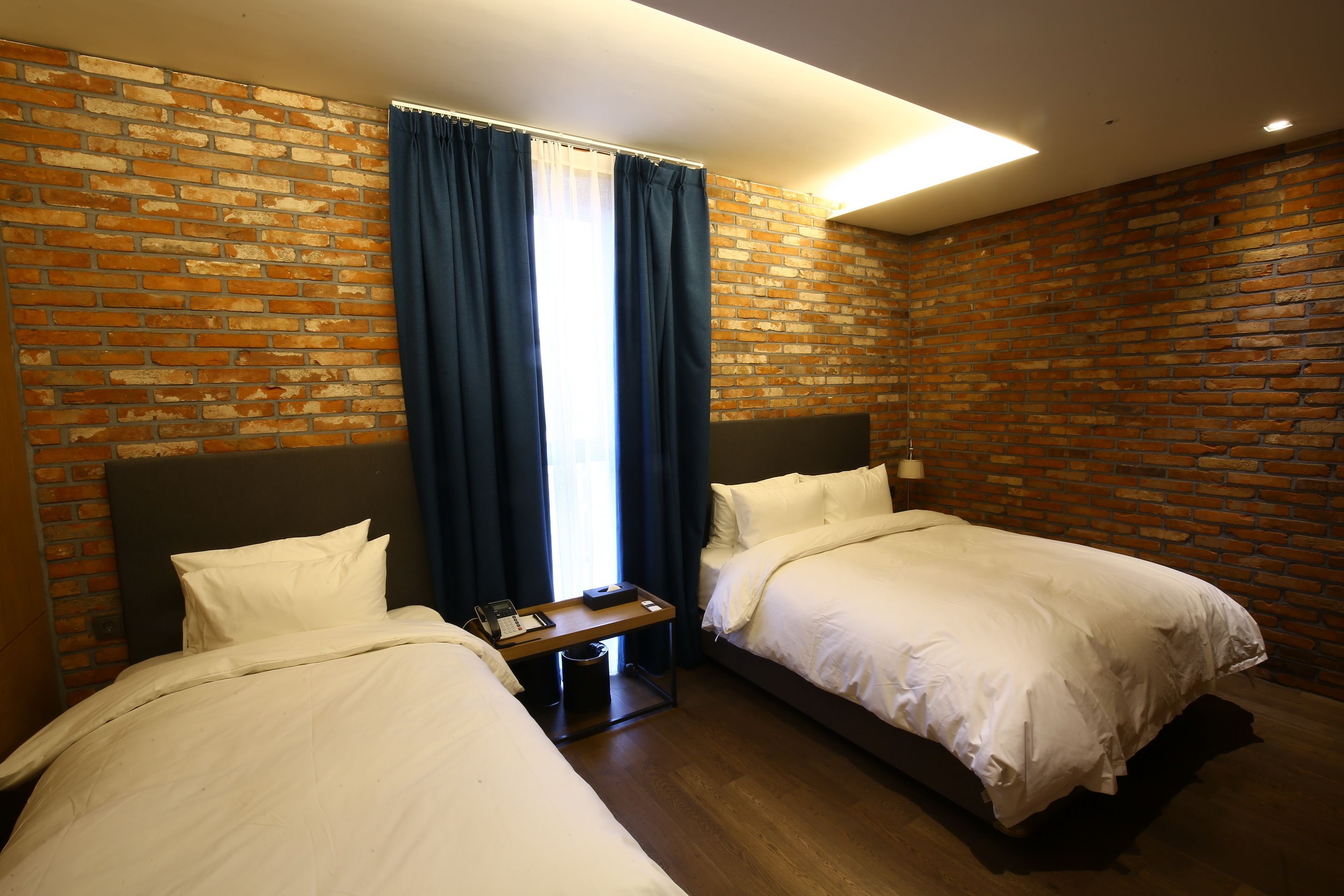 deluxe family room | premium bedding, in-room safe, soundproofing, iron/ironing board