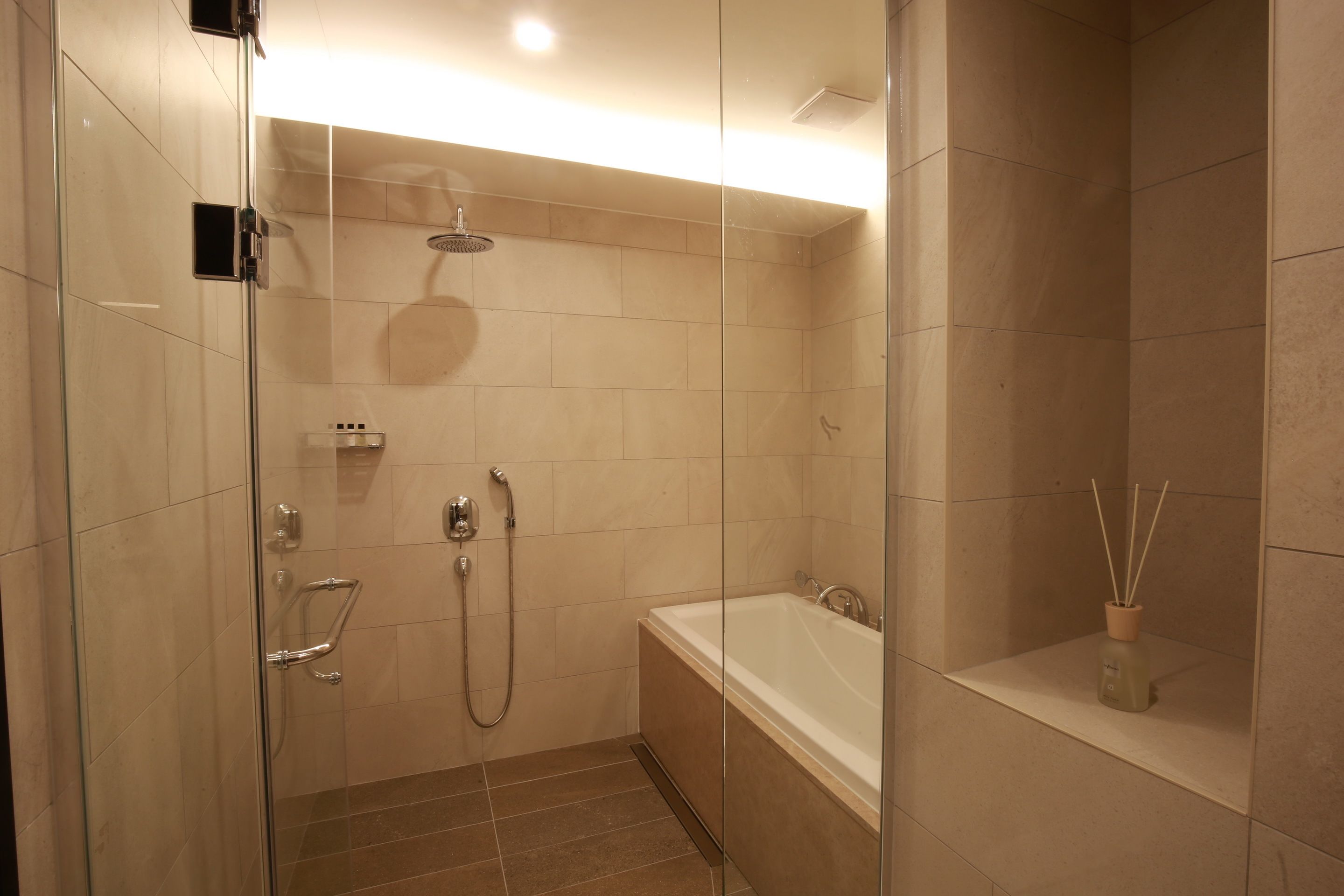 junior suite | bathroom | hair dryer, bathrobes, slippers, bidet