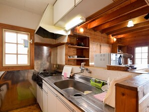 Cottage | Private kitchen | Fridge, microwave, stovetop, electric kettle - Seaside Resort Minami Atami Ichibankan (Atami)