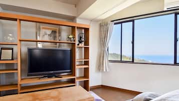 Room in main building (A-5/A-4/B-5/B-4/A-6) - Main Building Guest Room 4-5F | Living area | Flat-screen TV