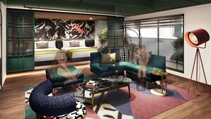 A modern living room with a sofa, armchair, and coffee table, a bed with a green headboard, and a large window with blinds. - NOCTIS Akihabara-Suehirocho (Tokyo)