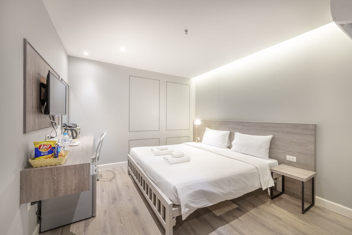 Habitación superior | Minibar, caja de seguridad en la habitación, wifi gratis y ropa de cama