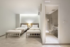 Minibar, brankas, Wi-Fi gratis, dan seprai linen