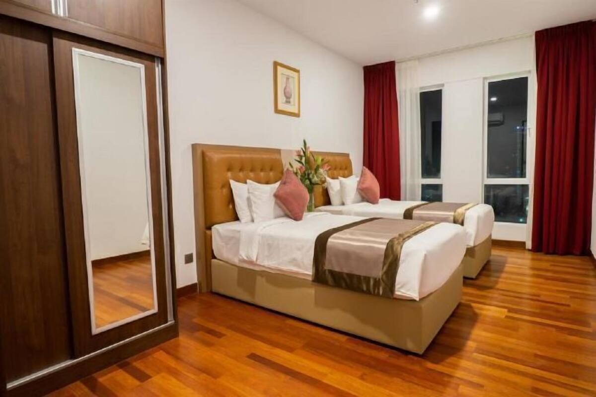 Luxe beddengoed, een minibar, een kluis op de kamer, een bureau