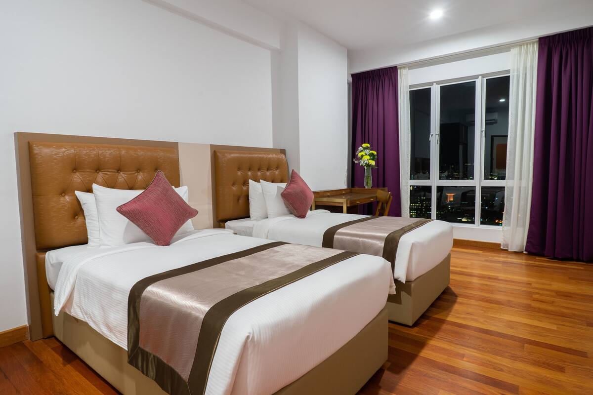 Luxe beddengoed, een minibar, een kluis op de kamer, een bureau