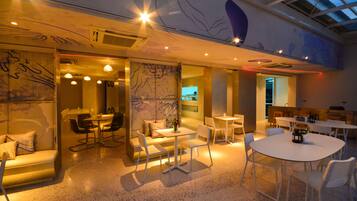 Breakfast, lunch, dinner served; international cuisine