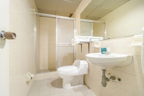 Quadruple Room | Bathroom | Shower, towels, soap, toilet paper