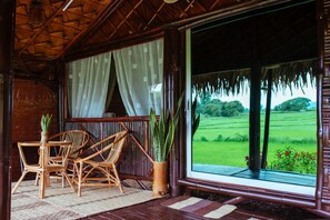 Habitación Prestigio, en el área del jardín (Bamboo) | Terraza o patio