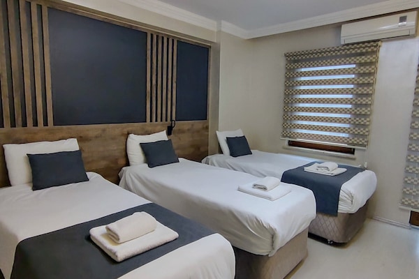 Ropa de cama de alta calidad, sistema de insonorización y wifi gratis