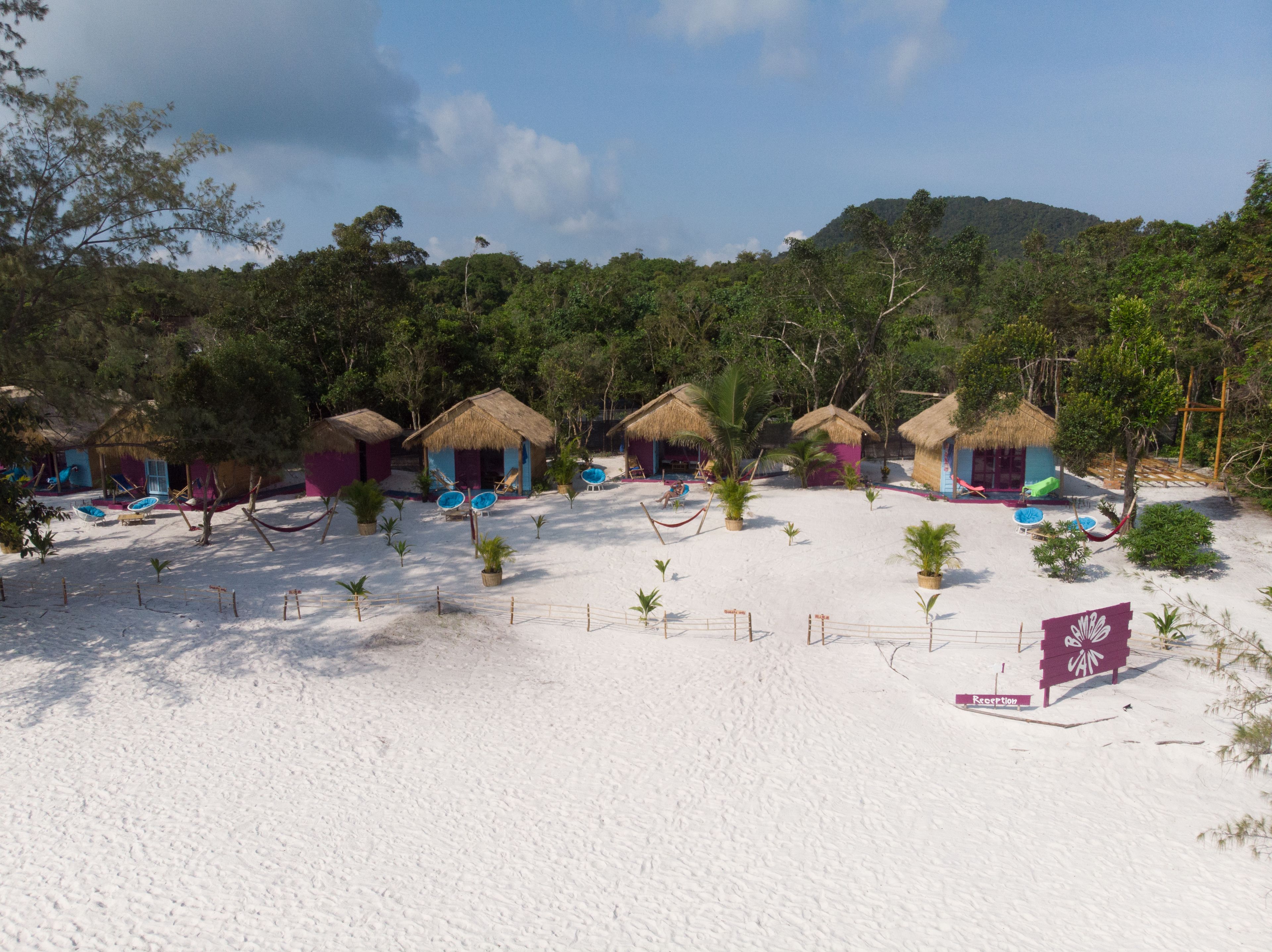 on the beach, white sand, sun-loungers, beach towels