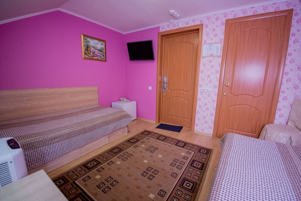 Economy Twin Room, Private Bathroom | 1 bedroom, in-room safe, iron/ironing board, free WiFi