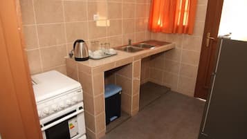 Standard Quadruple Room, 2 Bedrooms | Private kitchenette