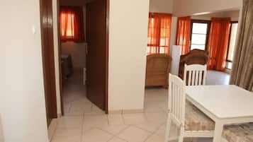 Standard Quadruple Room, 2 Bedrooms | Living area