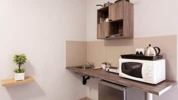 Apartment | Private kitchen | Fridge, microwave, stovetop, coffee/tea maker