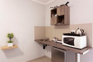 Apartment | Private kitchen | Fridge, microwave, stovetop, coffee/tea maker