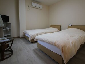 Western Style Room, Non Smoking | Free WiFi, bed sheets - Minshuku Takesugi (Yakushima)