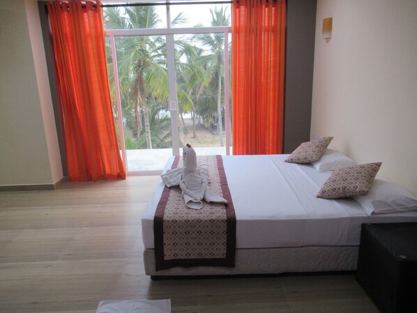 Standard Double or Twin Room, 1 Bedroom, Non Smoking, Partial Ocean View | Minibar, in-room safe, desk, iron/ironing board