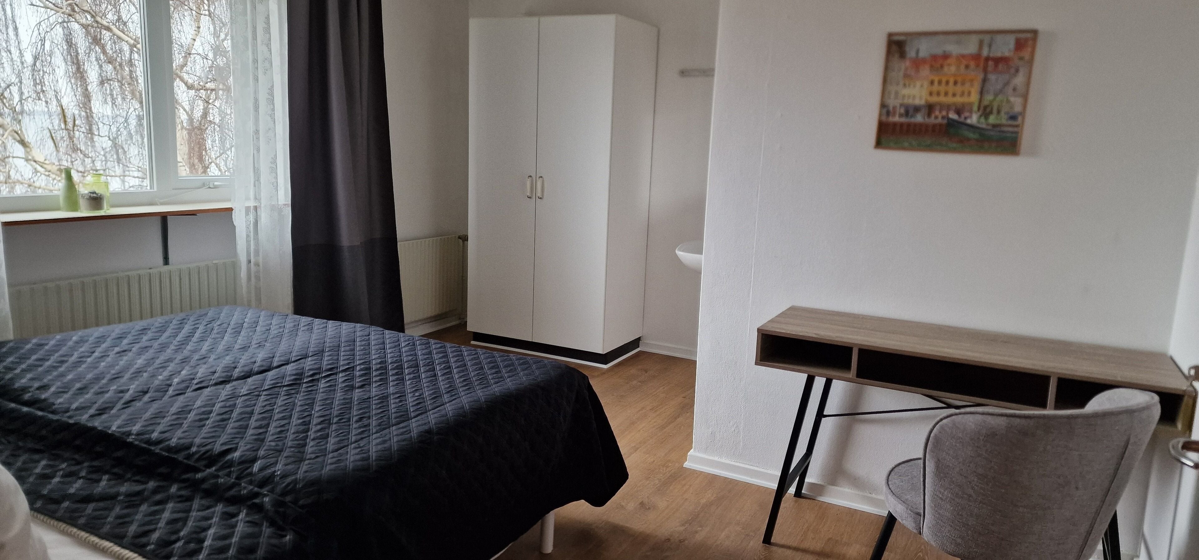 Economy Double Room, 2 Single Beds, Shared Bathroom, Garden View